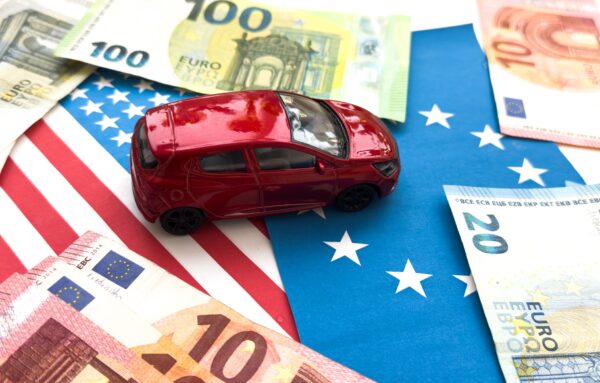 euros,notes,on,a,european,union,flag,background.,taxes,for